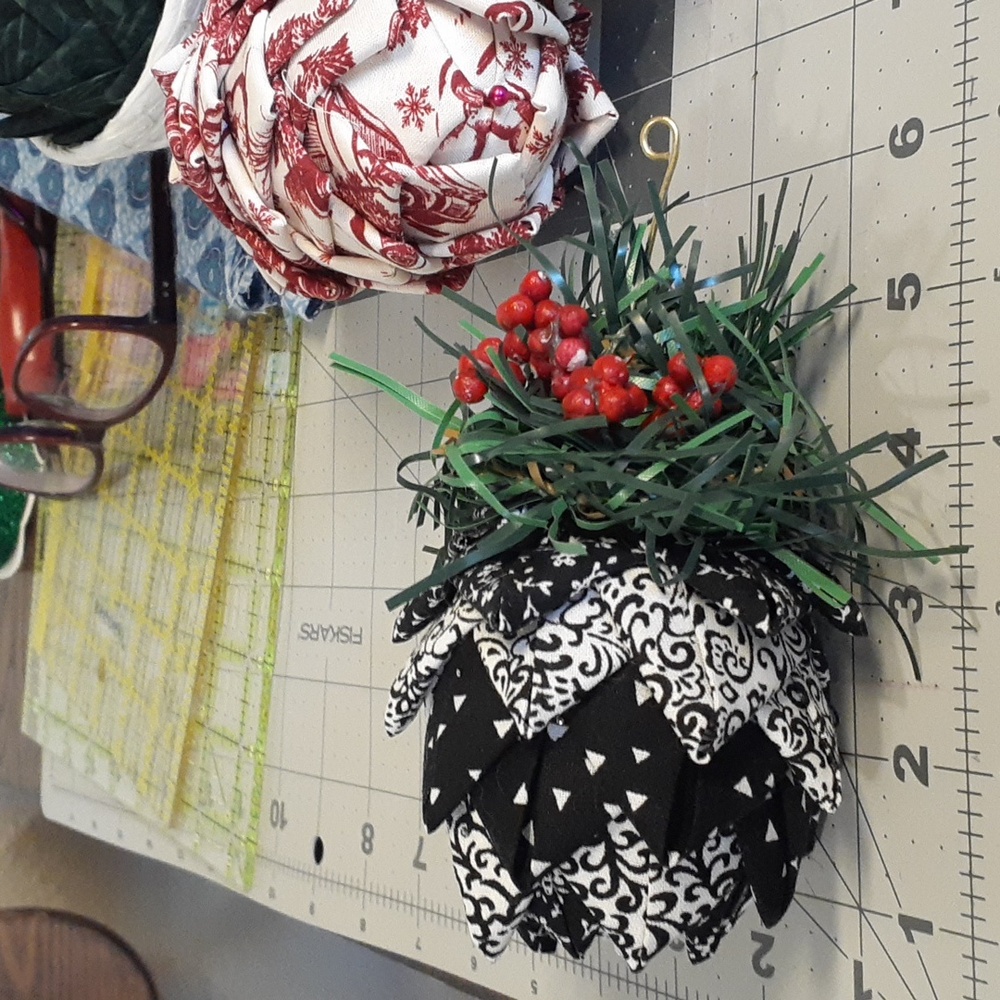 #14 Quilted Pinecone Shaped Christmas Decor. Approximately 3"x4".